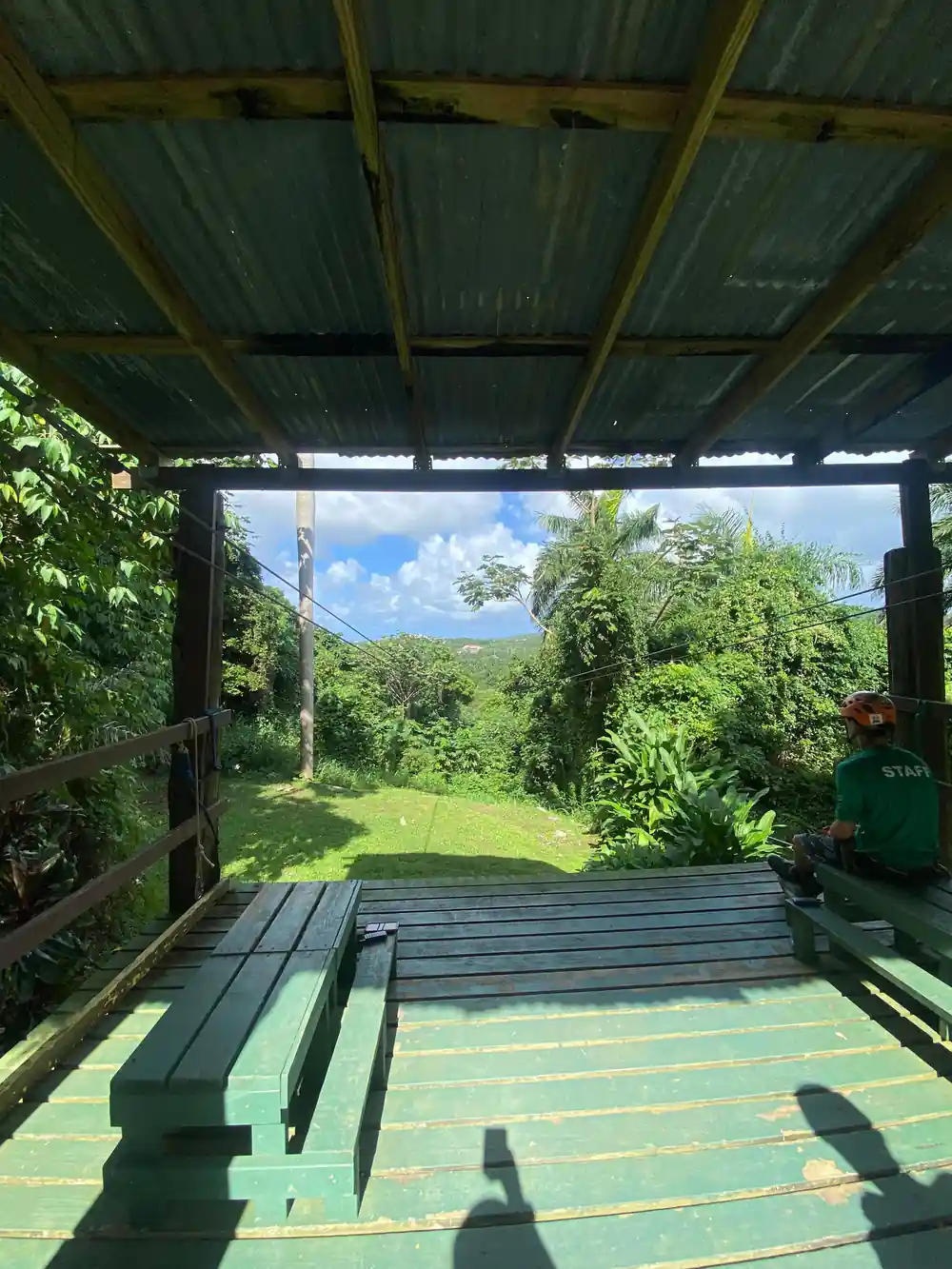A covered platform looking out over the green